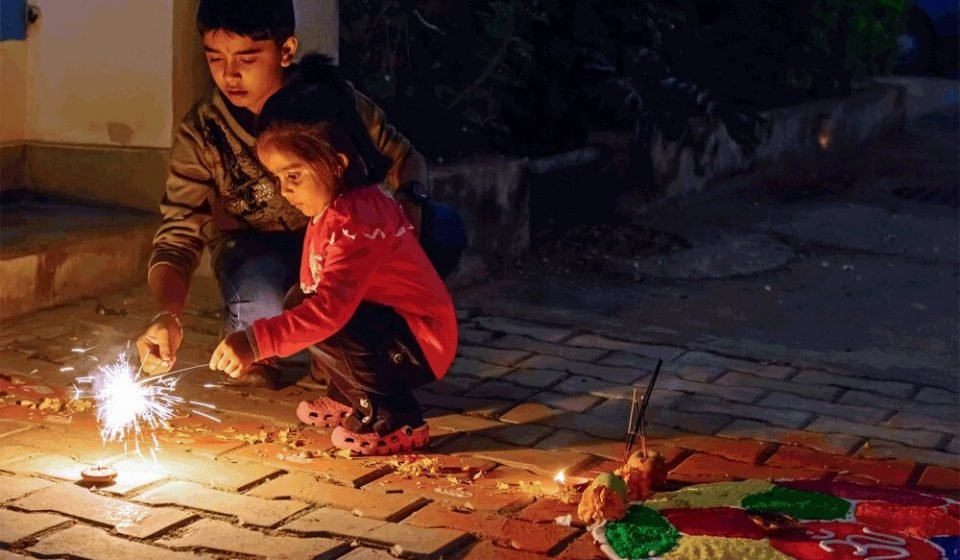 Children Enjoying Fireworks During Tihar Festival, Culture of Nepal